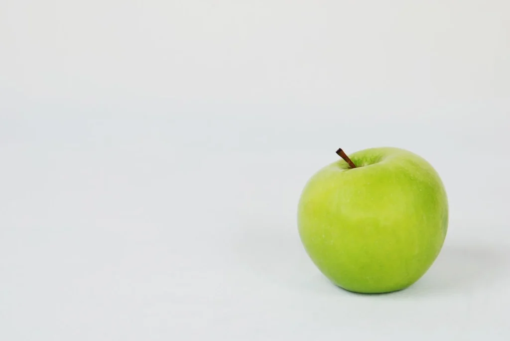 Fresh green apple representing healthy fruit choices for people managing diabetes
